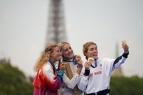 Julie Derron, Cassandre Beaugrand, center, and Beth Potter
